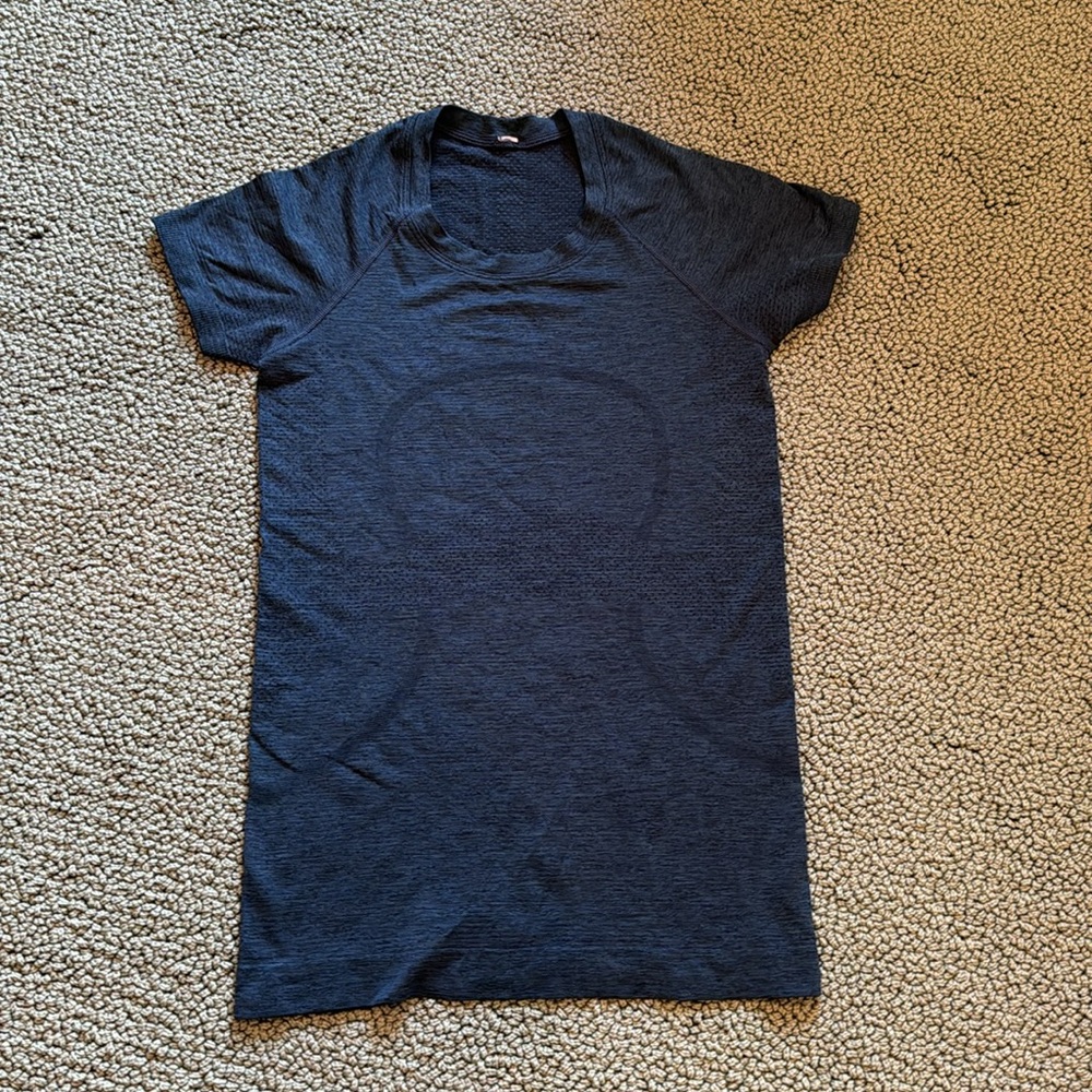 Lululemon Navy swift let tech size 4